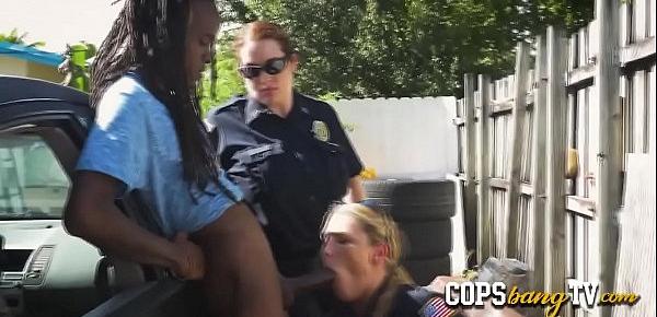  Big titty female cop is riding a huge black shlong in public.
